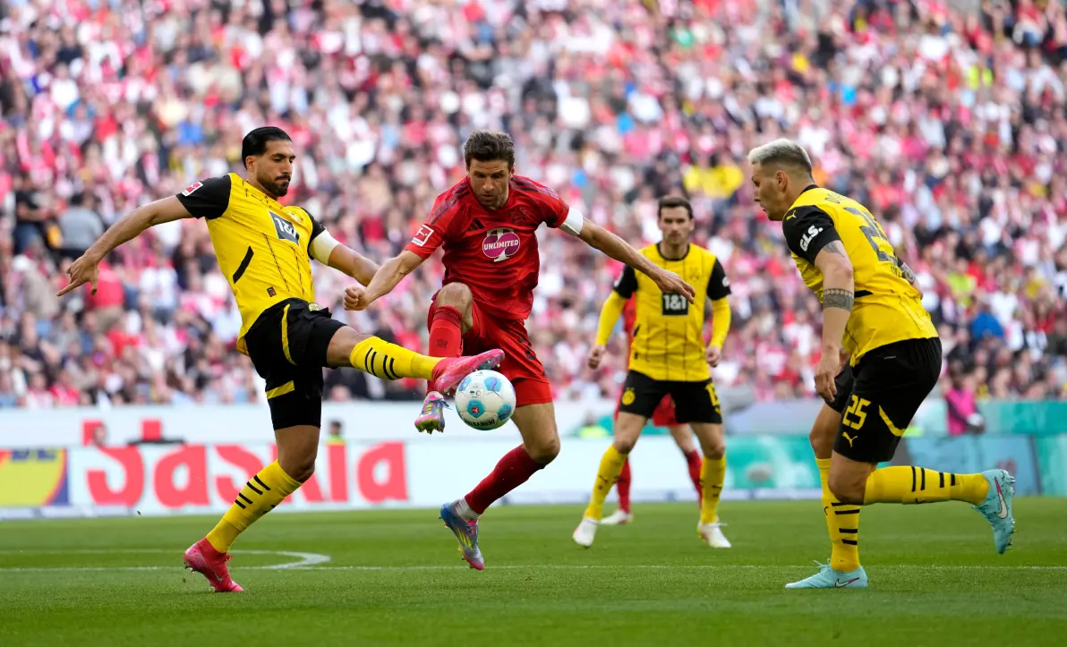 拜仁慕尼黑逆转胜多特蒙德,保持德甲领先位置 拜仁慕尼黑逆转胜多特蒙德,保持德甲领先位置